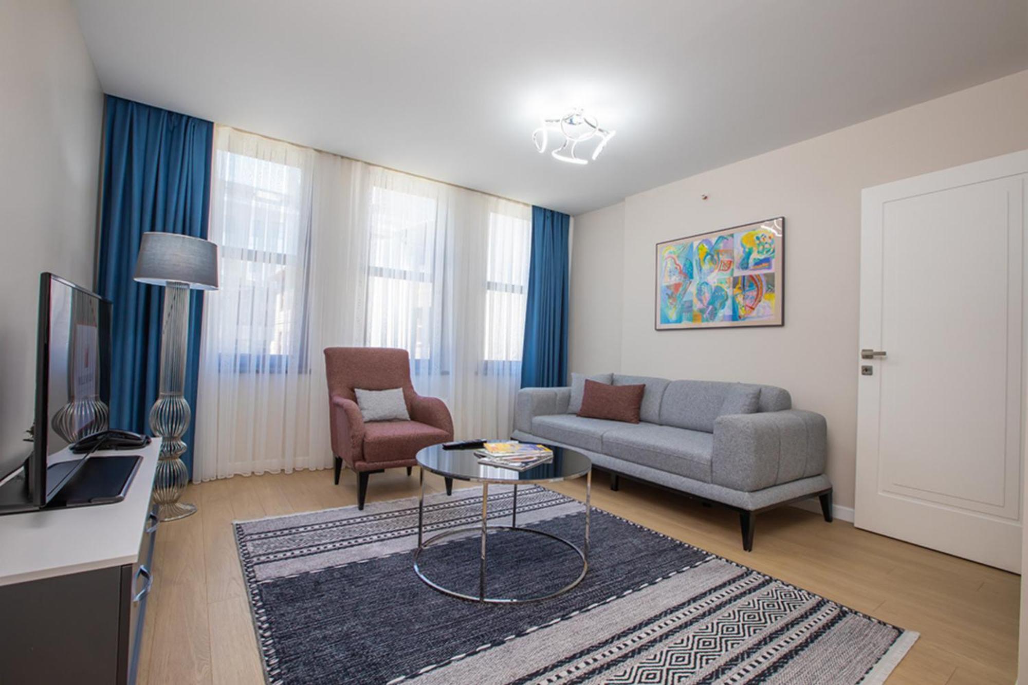 Millennium Istanbul Golden Horn Hotel Luaran gambar A living room in a serviced apartment in Dubai, United Arab Emirates
